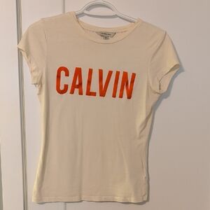 Calvin Klein Cream Tee with Orange Lettering